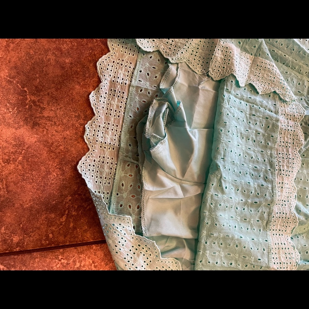 Brand new, mint green size medium dress/romper with shorts underneath.